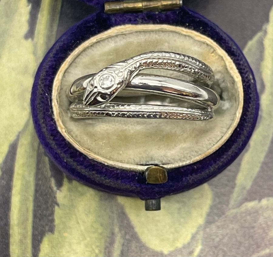 Vintage Platinum snake ring set with a single diamond to the head