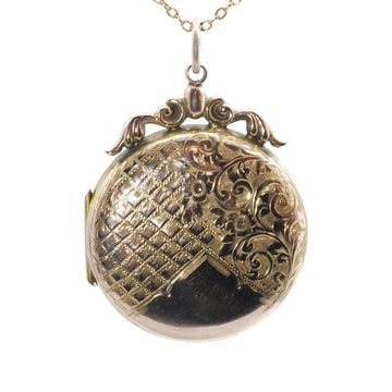 Antique Fancy Engraved 9ct Front and Back Round Locket with Ornate Bale top.