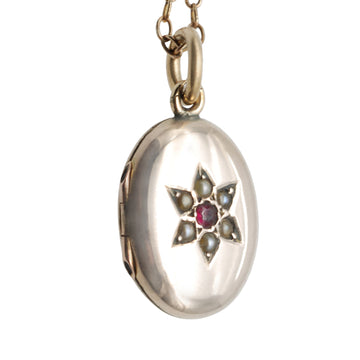 Small Antique Oval 9ct Rose Gold B+F Locket set with Seed Pearls and Cabochon Garnet.