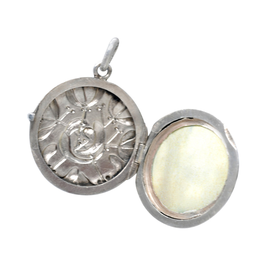 Antique Round Silver Locket Decorated with Mistletoe.