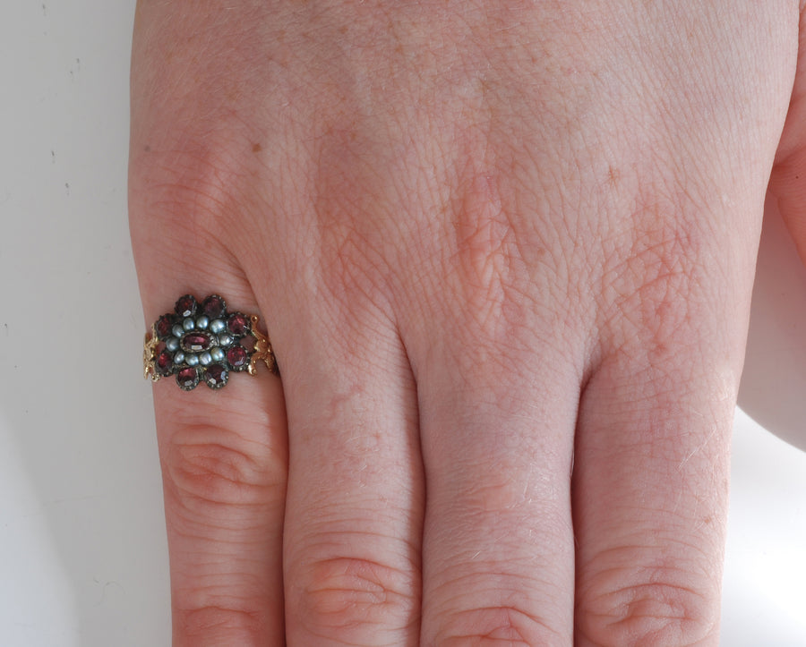 9ct rose gold onyx, seed pearl and diamond ring.