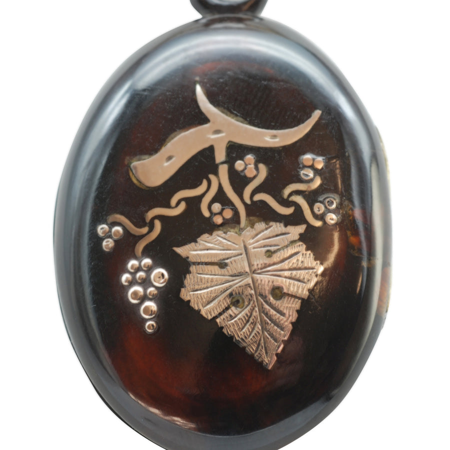 Victorian Pique locket with grape leaf design
